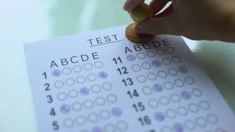 B grade on test paper, academic assessment result, passing score for entry exams Stock Footage 97282861