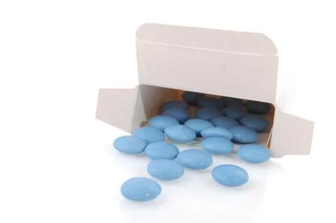 B ox with blue tablets Foto stock
