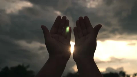 B roll 4k. of Human hands open palm up worship god with sunset like hope. Stock Footage 159261749