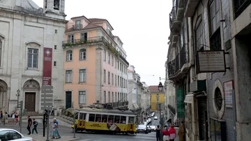 B-roll atmosphere shot of lisbon alley crossroads with tram Stock Footage 85738895