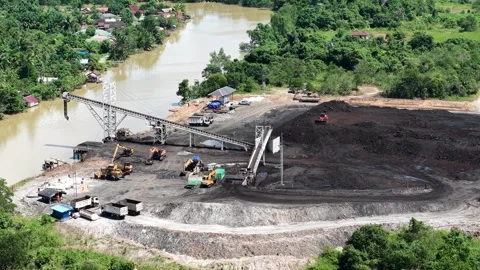 B-roll drone footage captures the daily operations at a large-scale coal st.. Video stock 342475750
