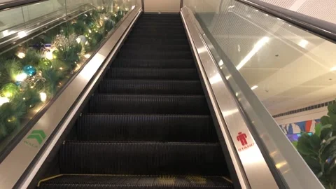 B-ROLL. POV Going up an escalator inside mall Stock Footage 206754867