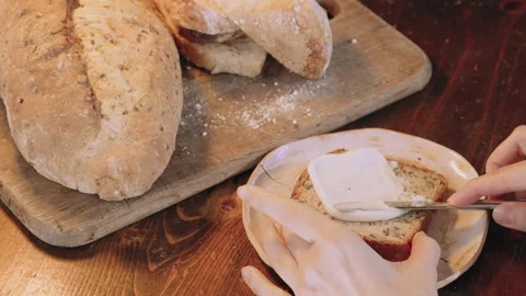 B roll spreading butter on bread Stock Footage 200993850