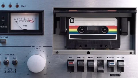 B Side of Old Cassette Tape Playing in Vintage Deck Player and Recorder, Stock Footage 175894783
