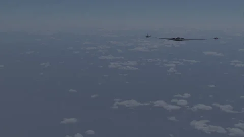 B2 Escorted by 2 F-35's Stock Footage 226886025