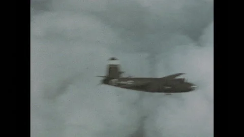 B26 QRJ Plane Flying Through Clouds Stock Footage
