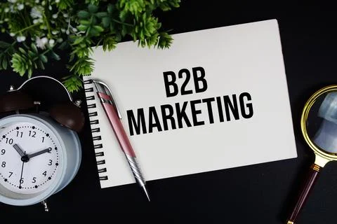 B2B Marketing text with alarm clock and magnifying glass Stock Photos
