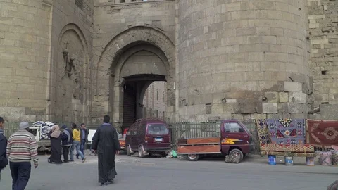 The Bab Zuweila gate tower situated in old historic district of Cairo Stock Footage 126429486