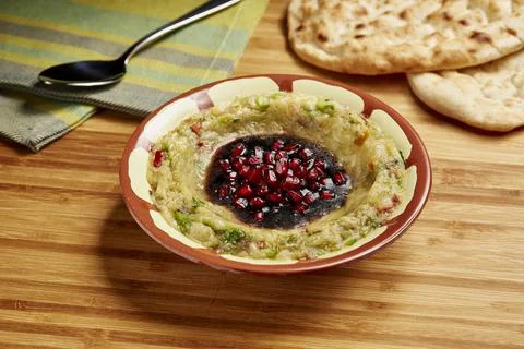 Baba Ghannoug with Bread served in dish isolated on table side view of middle Foto stock
