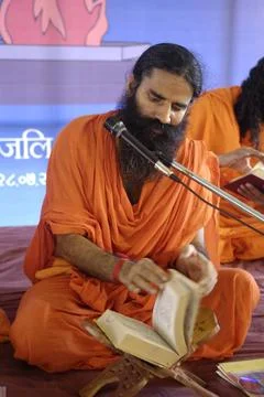 Baba Ramdev Reading scriptures in Patanjali Yogapeeth haridwar at uttar pr... Stock Photos