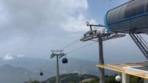 Babadag Cable car in Turkey between clouds over the mountains Stock Footage 337152040