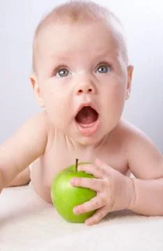 Babe and an apple #7 Stock Photos