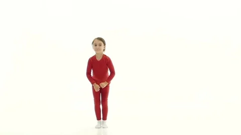 Babe jumps up and has fun. White background. Slow motion Stock Footage 80705437
