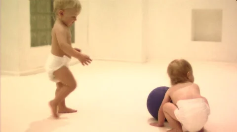 Babies playing with ball Stock Footage 43695145