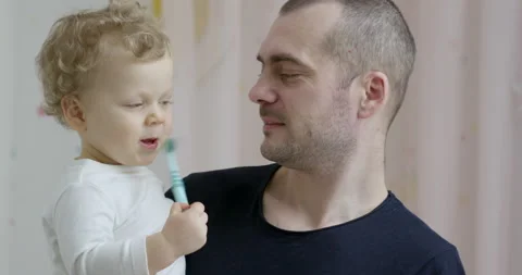 Baby years old brushes his teeth with Stock Video Pond5