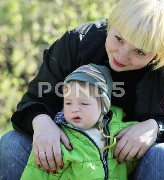 Baby and mother Stock Photos