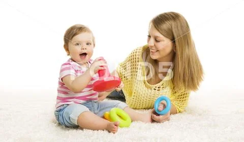Baby and Mother Play Toy Rings, Infant Kid Playing Building Blocks, Education Stock Photos