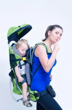 Baby in backpack Stock Photos
