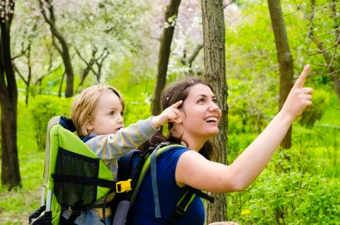 Baby in backpack Stock Photos
