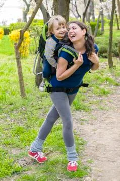 Baby in backpack Stock Photos