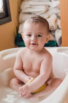 Baby in the bath Stock Photos