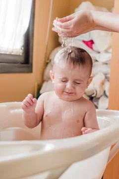 Baby in the bath Stock Photos