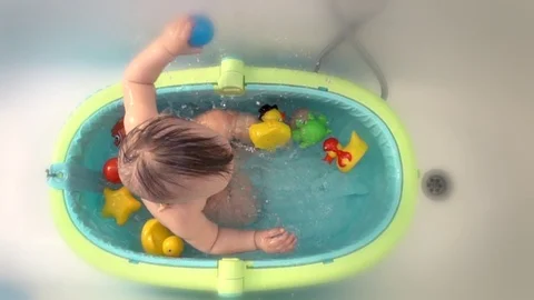 Baby is bathing Stock Footage 127183762