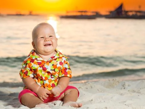 Baby on the beach Stock Photos