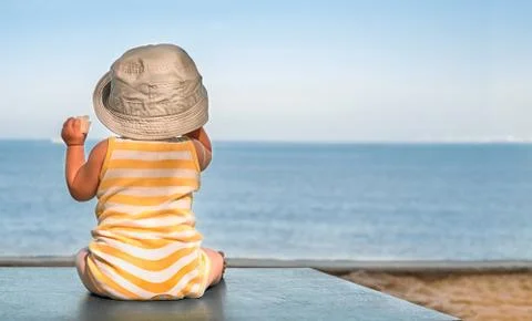 Baby on the beach Stock Photos