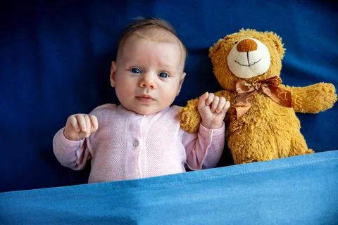 Baby with bear Stock Photos
