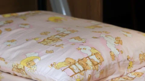 Baby bed with a case in the form of a mouse for the tooth fairy. The mouse-case Stock Footage 119189621