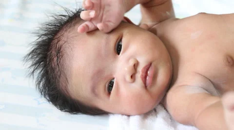 Baby on the bed Stock-Footage 30344945