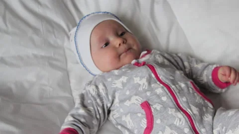 Baby on the bed Stock Footage 196711635