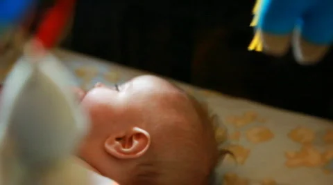 Baby in bed playing Stock Footage 727986