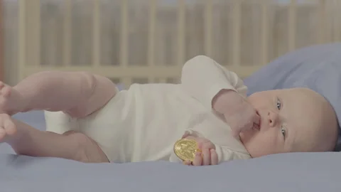 Baby with bitcoin 2 Stock Footage 264744678