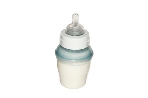 Baby bottle with formula on white background. Stock Photos