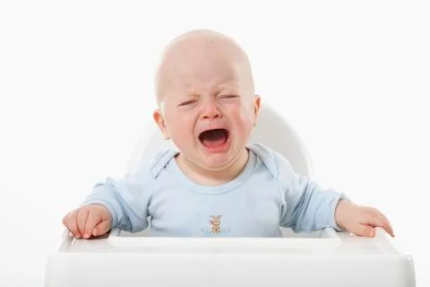 Baby boy (6- 11 Months) crying Stock Photos