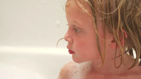 A baby boy and little girl play in batht... | Stock Video | Pond5 