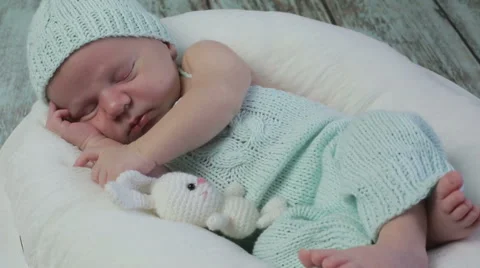 A baby boy asleep Stock Footage 67492061
