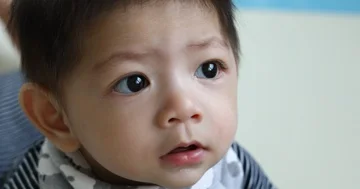 Baby boy crawl playing on soft mattress floor in nursery room Stock Footage 85992602