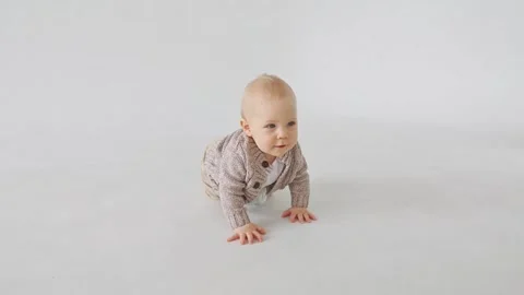 Baby boy crawling on a white background Video stock 170706376