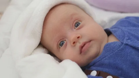 Baby boy in crib 스톡 동영상 103532780