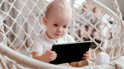 Baby Boy Learning New Digital Tablet Stockbeeldmateriaal 101040139