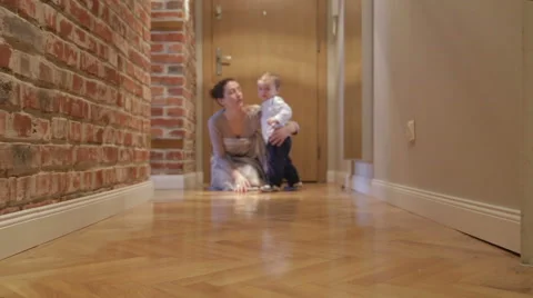 Baby boy makes first steps Stock Footage 44325855