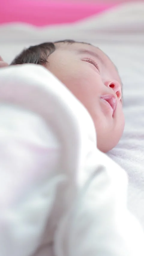 The baby boy sleeping on the bed Stock Footage 327847880