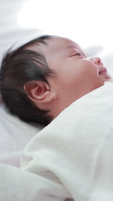 The baby boy sleeping on the bed Stock Footage 327847906