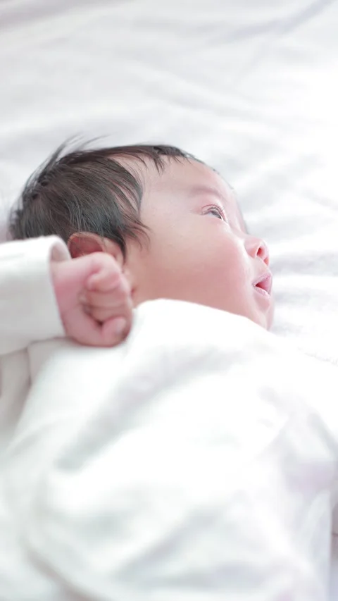 The baby boy sleeping on the bed Stock Footage 327848032