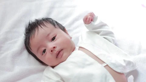 The baby boy sleeping on the bed Stock Footage 327848039
