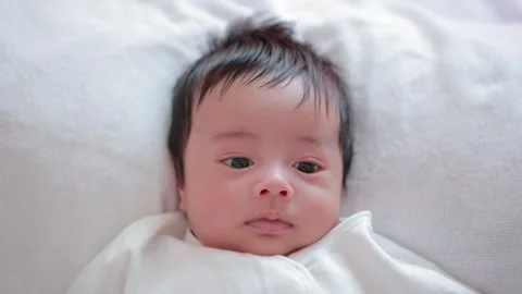 The baby boy sleeping on the bed Stock Footage 327848054