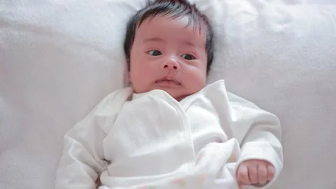 The baby boy sleeping on the bed Stock Footage 327848070